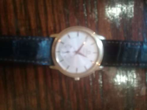 Omega Chronometer 18k Gold with original international warranty and box bought in Geneve 1997